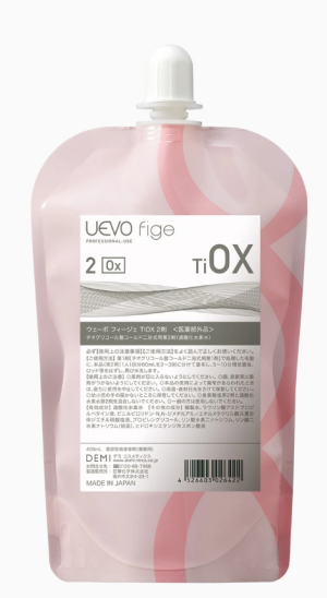 Второй этап процедуры для фиксации завивки волос Demi UEVO FIGE TiOX-2